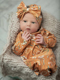 Load image into Gallery viewer, Rust Botanical Baby Gown and Bow Headband